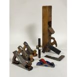 Vintage tools, an ebony and brass mounted joiners scribe, two rosewood and brass mounted squares,