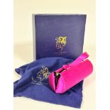 A Philip Tracey pink satin cylinder evening bag with gunmetal clasp fastening, shows no signs of