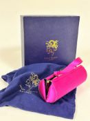 A Philip Tracey pink satin cylinder evening bag with gunmetal clasp fastening, shows no signs of