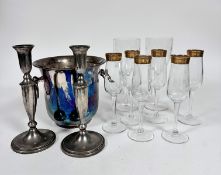 An Epns twin ring handled ice bucket (19cm x d.22cm), a pair of Epns baluster candlesticks (26cm), a