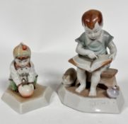 A Zsolnay Pecs porcelain figure of a Child Squatting with Ball, decorated with polychrome enamels,