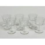 A set of six Edwardian slice cut champagne bowls, on tapered columns and circular bases, (11cm x