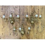 A set of three lacquered brass wall sconces, each with three scrolling branches, H34cm