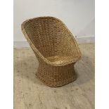 A vintage wicker chair, H75cm