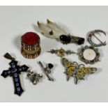 An enamelled crucifix pendant with stylised flower design, (L:6cm) an enamelled and paste set