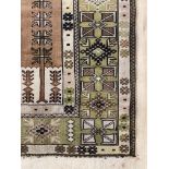 A Turkish rug, of stylised geometric design, 156cm x 94cm