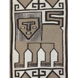 A North African flat weave rug, decorated in shades of brown with a stylised lion 170cm x 80cm