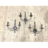 A set of three anodised metal twin branch wall sconces, H47cm