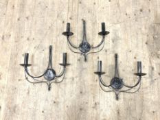 A set of three anodised metal twin branch wall sconces, H47cm