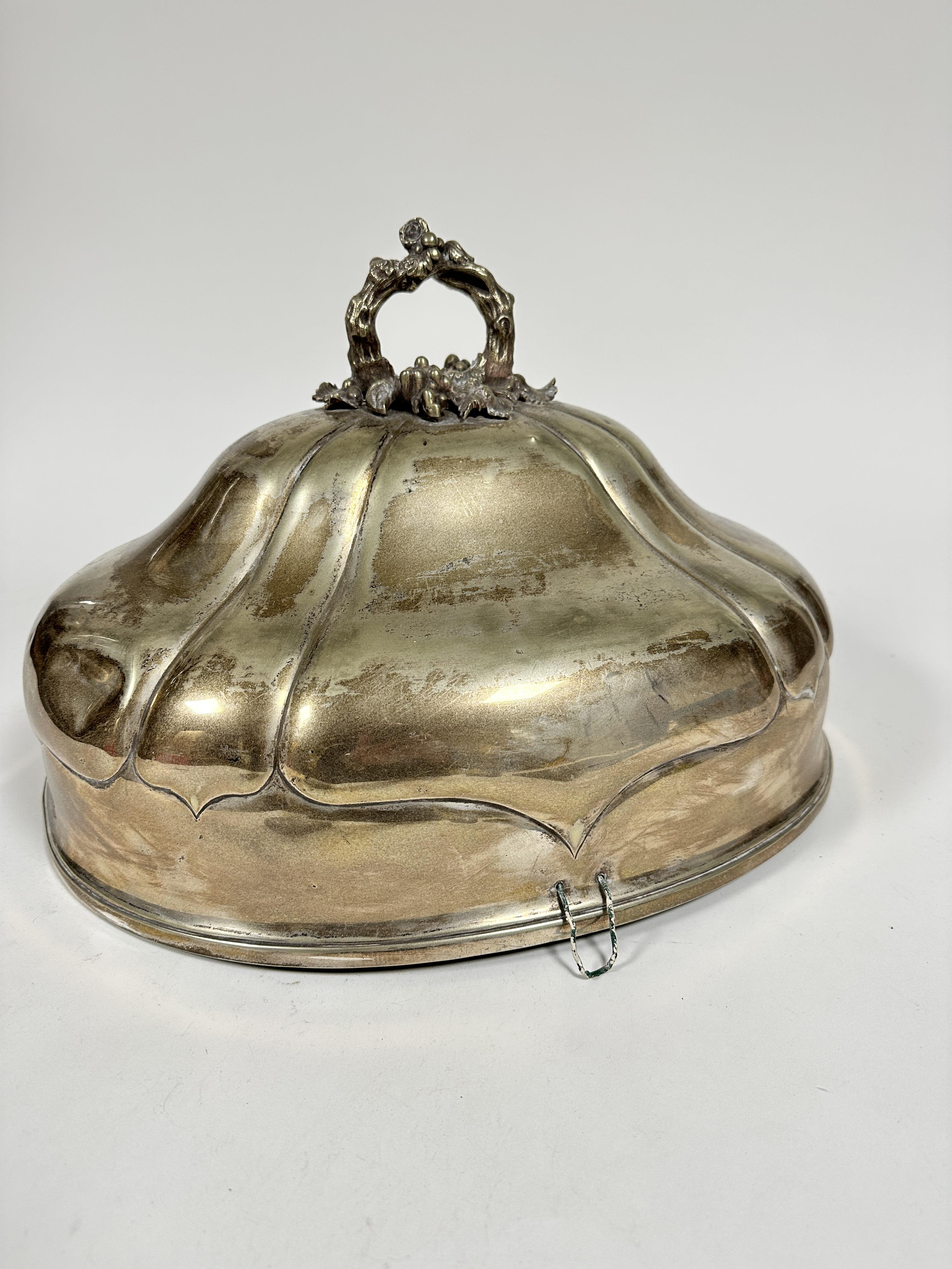 A late 19thc Epns oval fluted design meat dish cover with rustic style knop handle with berries