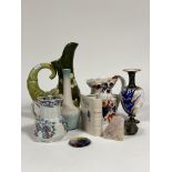 A group comprising of a Bretby Art Nouveau decorative jug decorated with green enameling and