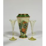 A Carlton Ware Art Deco stepped topped taper vase the top with gilt and green boarder above a floral