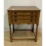 A 1930's oak three drawer table canteen, by Mappin and Webb, containing EPNS flatware for twelve