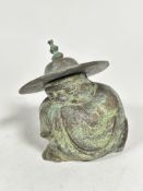 A bronzed metal figure of a crouching man with hat (h 15.5cm x 11cm x 8cm)