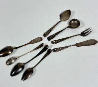 A Victorian Fiddle pattern teaspoon, a Georgian mustard spoon, two various Georgian teaspoons and