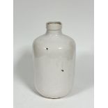 A modern cream craquelure large bottle style vase with intentional distressed patches, (44cm x