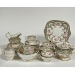 A 19th century Derby part tea service decorated with gold gilding and silver and floral enameling,