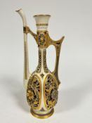 A Royal Worcester cane ware rosewood ewer in the Middle Eastern style, missing knop, spout
