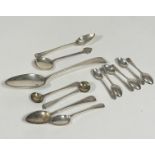 A pair of George III silver gilt Old English pattern salt spoons, (L: 10cm) engraved with initials