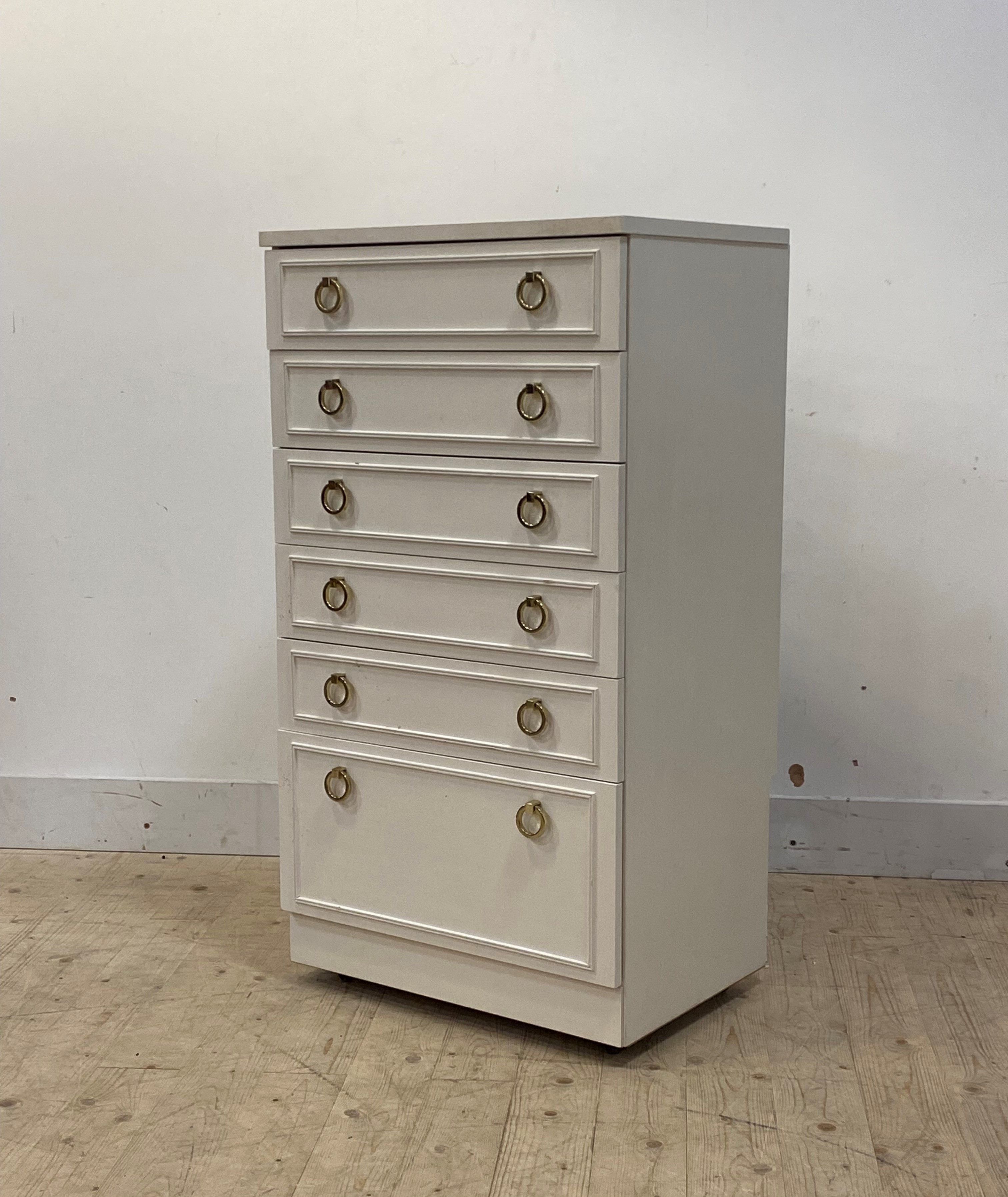 A Vintage white painted chest, fitted with six drawers, raised on castors, H112cm, W61cm, D45cm