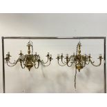 A near pair of Dutch style brass chandeliers, with eight scrolled branches, D85cm