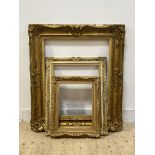 A 19th century Rococo Revival giltwood and gesso picture frame (small losses and over painted) (91cm