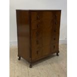 An early 20th century mahogany chest, fitted with five graduated drawers, on cabriole supports