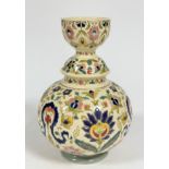A Hungarian KB pottery Zsolnay Pecs style baluster vase with cup style top decorated with stylised