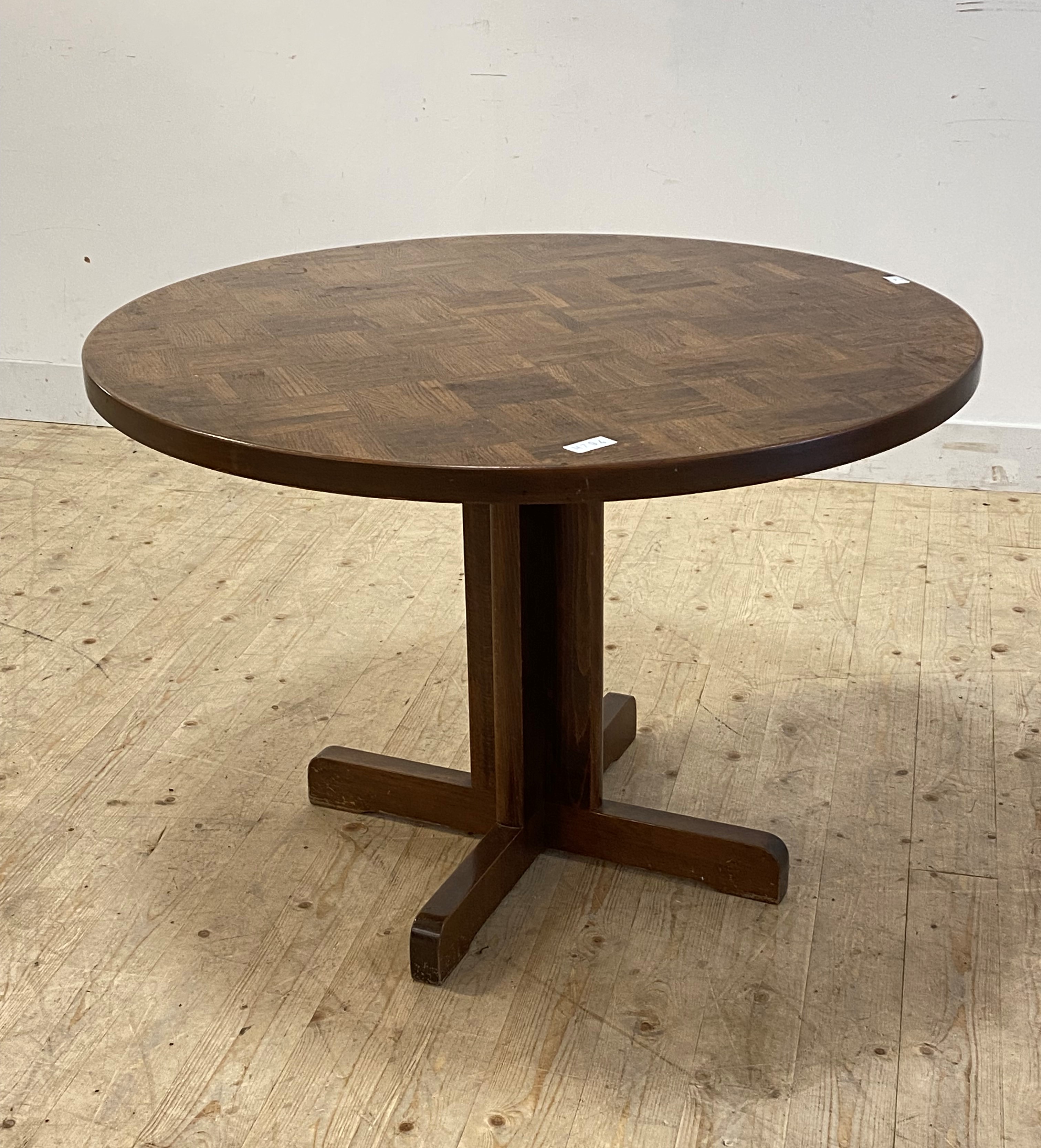 A stained oak and beech centre or dining table, late 20th century, the circular parquetry top raised