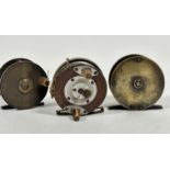 A 1920s treen brass and aluminum mounted fly reel, unmarked, (d 6.5cm) a Charles Farlow & Co