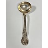 A modern Edinburgh 1981 silver handmade sauce ladle with hammered shaped bowl and textured handle,