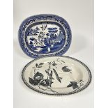 A Late Mayers china oval meat ashet decorated with black and white transfer printed birds and