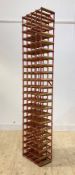 A large wine rack, with provision for 84 bottles, 208cm x 42cm x 24cm