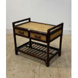 A Vintage stained bamboo side table fitted with two drawers over an under tier, H62cm, W72cm, D46cm