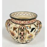 A Hungarian pottery Zsolnay Pecs style cachepot with pierced rim to top and pierced oval side