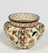 A Hungarian pottery Zsolnay Pecs style cachepot with pierced rim to top and pierced oval side
