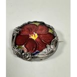 A London silver mounted William Moorcroft circular panel with stylised anemone flower and