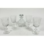A set of four large Edinburgh Crystal style red wine glasses of tapered form on knop stems, with