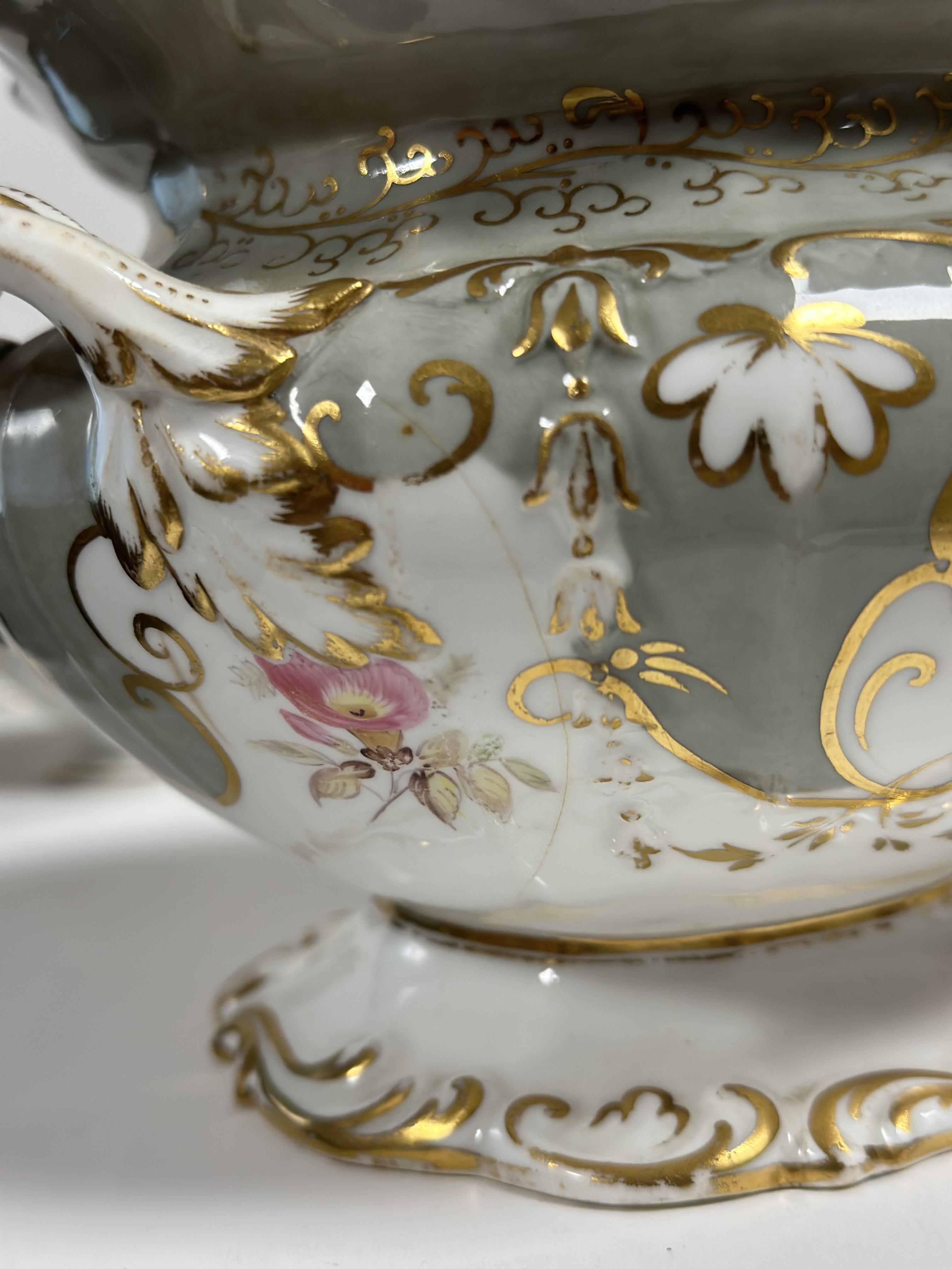 A 19th century Derby part tea service decorated with gold gilding and silver and floral enameling, - Image 3 of 4