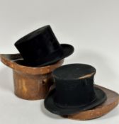 A vintage leather hat box containing an opera hat a/f, and a silk beaver hat by Thomas Townend &