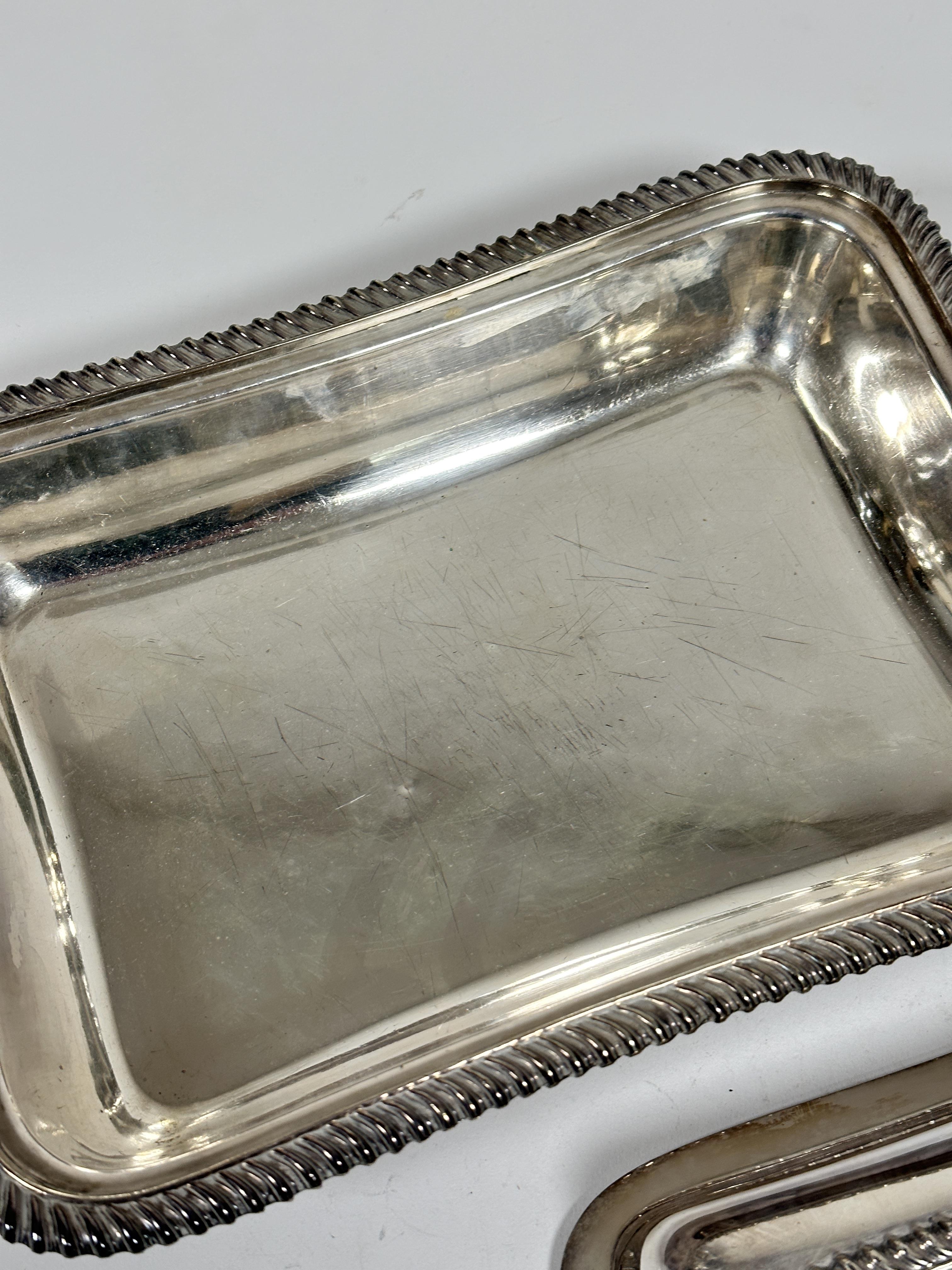 An Epns rectangular gadroon rimmed entree dish and cover, shows signs of gentle use, (including - Image 2 of 2