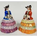 A pair of AE Gray & Co of Hamley china figure lady biscuit containers decorated with polychrome