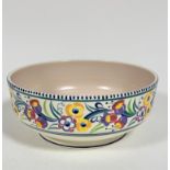 A Poole pottery large fruit bowl with traditional stylised harebell and floral border, (11.5cm x