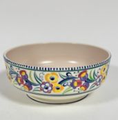 A Poole pottery large fruit bowl with traditional stylised harebell and floral border, (11.5cm x