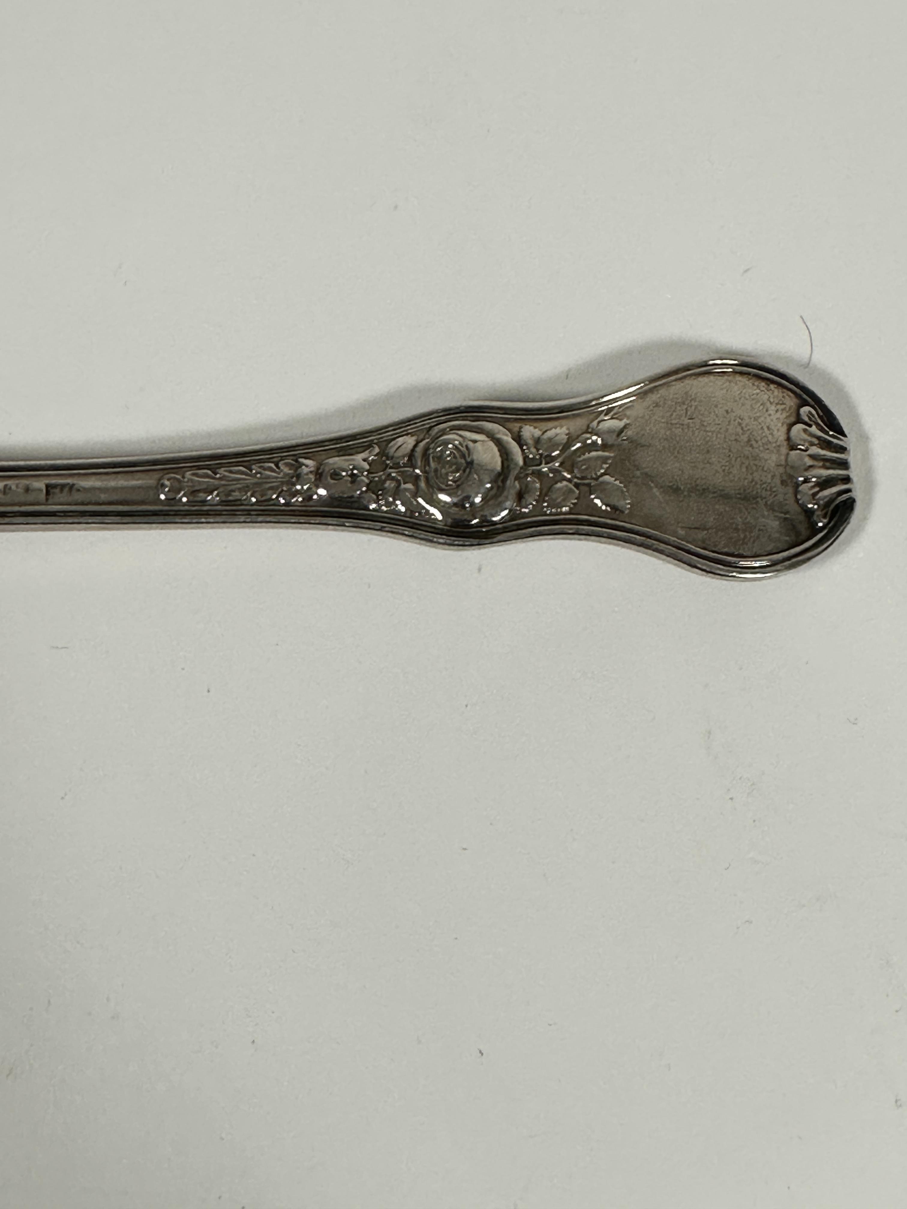 A Georgian silver shaped sauce ladle with chased rose and leaf design with fan shell chased rear - Image 4 of 4
