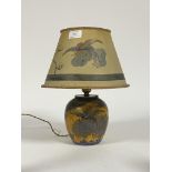 A Carlton ware Chinse bird and cloud pattern table lamp, well gilded and enamelled on a deep blue