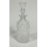 An Edinburgh Crystal whisky decanter of cylinder form, with etched thistle and hobnail cut design,