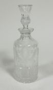 An Edinburgh Crystal whisky decanter of cylinder form, with etched thistle and hobnail cut design,