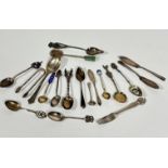 A collection of miscellaneous Continental and British souvenir type teaspoons with various crests,