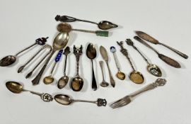 A collection of miscellaneous Continental and British souvenir type teaspoons with various crests,